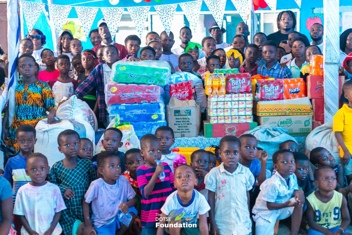 Children and donated supplies at Graceland Needy Childcare Orphanage